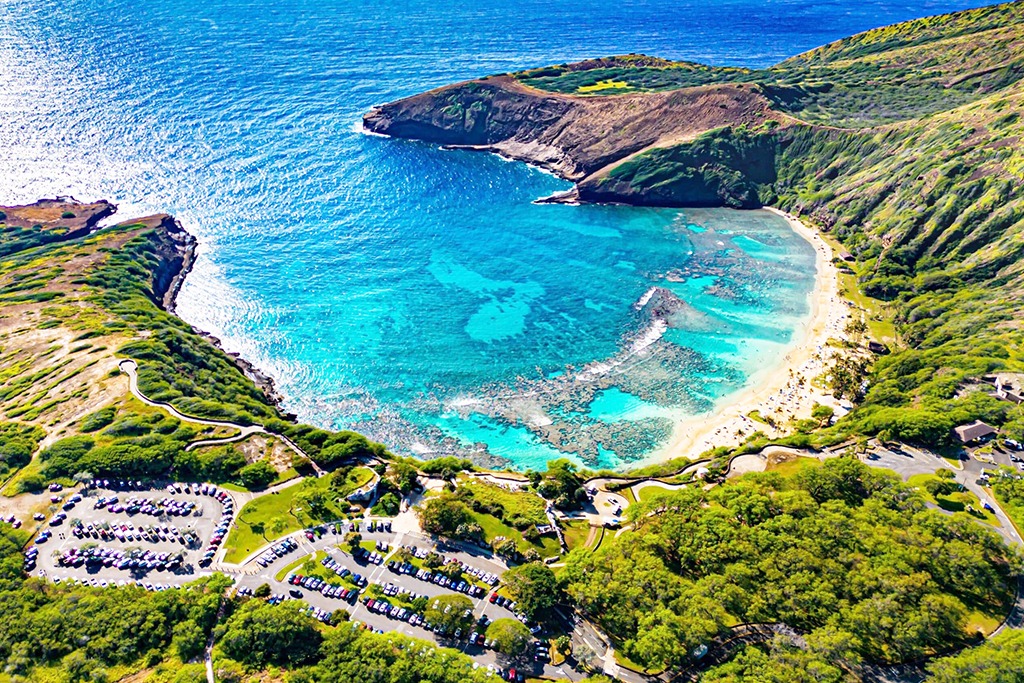 Hanauma Bay's curved reef and beach seen from above