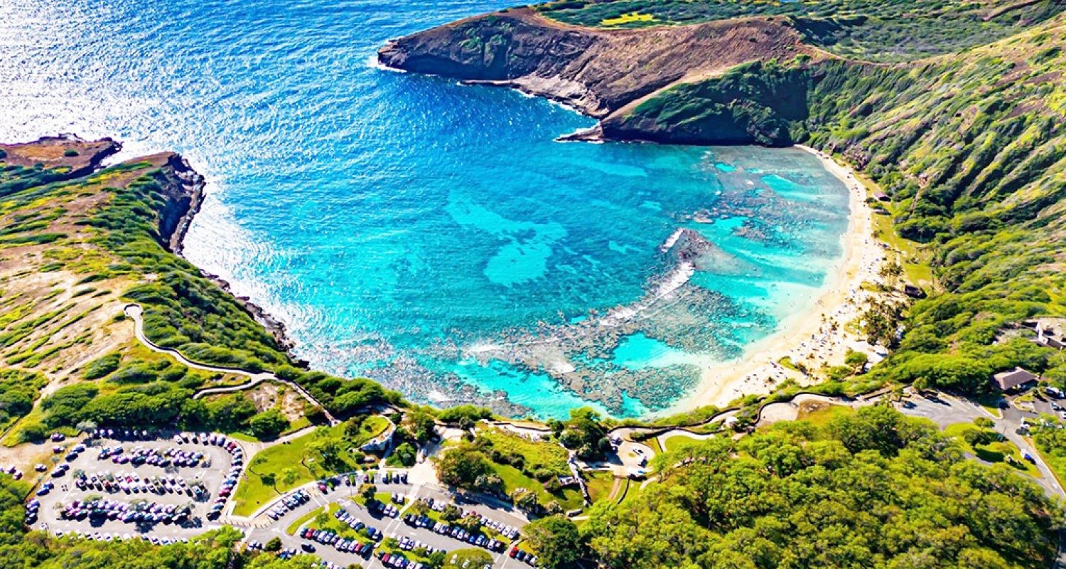 Hanauma Bay's curved reef and beach seen from above