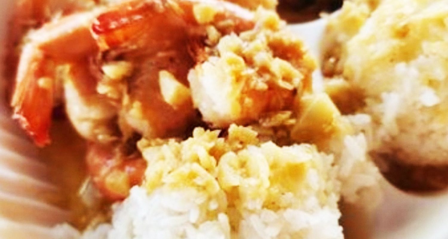 A plate of garlic shrimp and rice from a North Shore shrimp truck